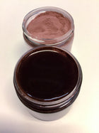 picture of  pinkish brown powder  and the  deep  black purple reconstituted juice that is made from this product
